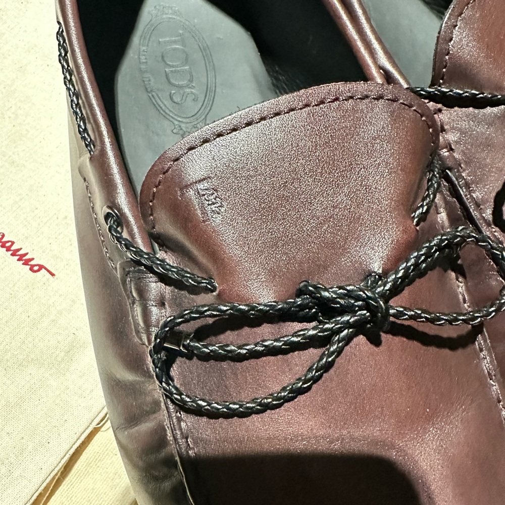 Tod's Men's Boat Shoes in Dark Brown with Black Laces